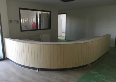 Curved reception counter in Magill